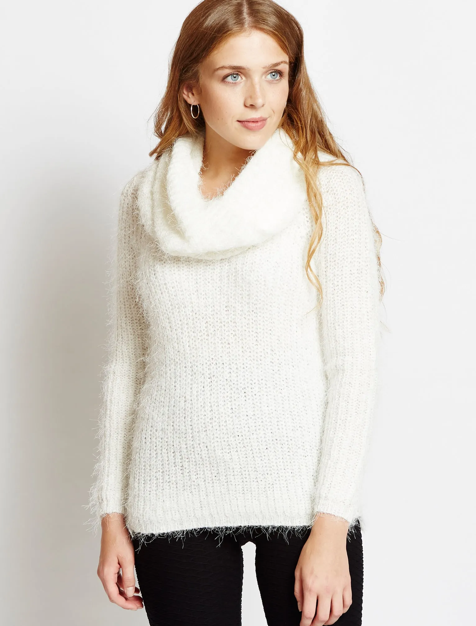 Amara Reya white jumper