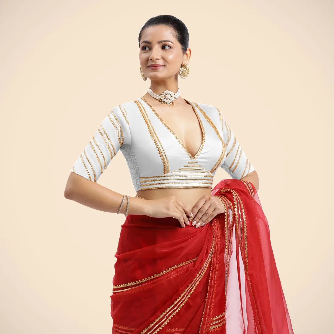 Navya x Tyohaar | Pearl White Elbow Sleeves FlexiFit™ Saree Blouse with Plunging V Neckline with Tasteful Golden Gota Lace